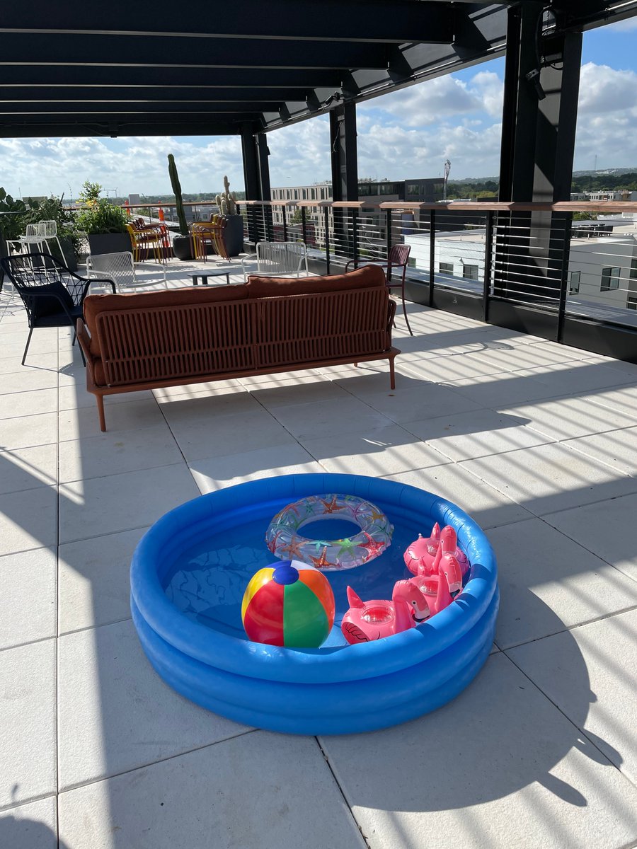 jrc_collins's tweet photo. When the pandemic hit, @atlassian went fully remote. This week, the #AtlassianATX office reopened in a new building all our own. There's a fitness studio, a parent's suite, tons of collaboration space, a wealth of perks, and an homage to an inside joke ... a rooftop pool. https://t.co/BwDwjAJmt9
