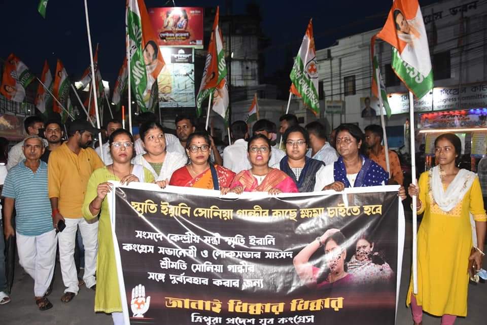 IYC's tweet photo. . @iyctripura carried out a symbolic protest in Agartala, burned the effigy of Smriti Irani and demand her apology for her inhumane behaviour toward our leader Smt Sonia Gandhi Ji earlier in Parliament. https://t.co/Z7zHUwOdCg