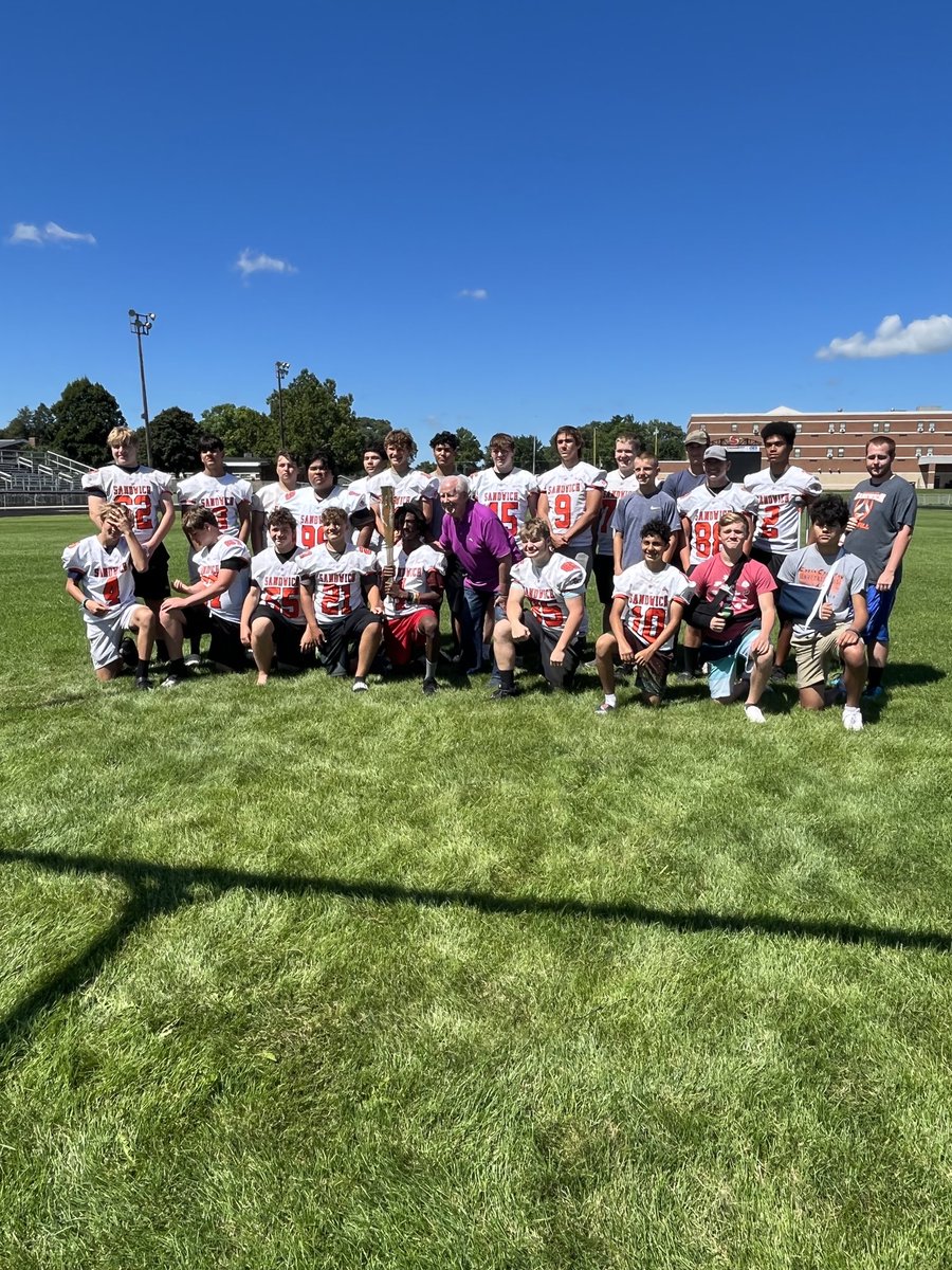 The Sandwich 30, carrying the torch (actual 2012 Olympic torch) “They say we can’t”