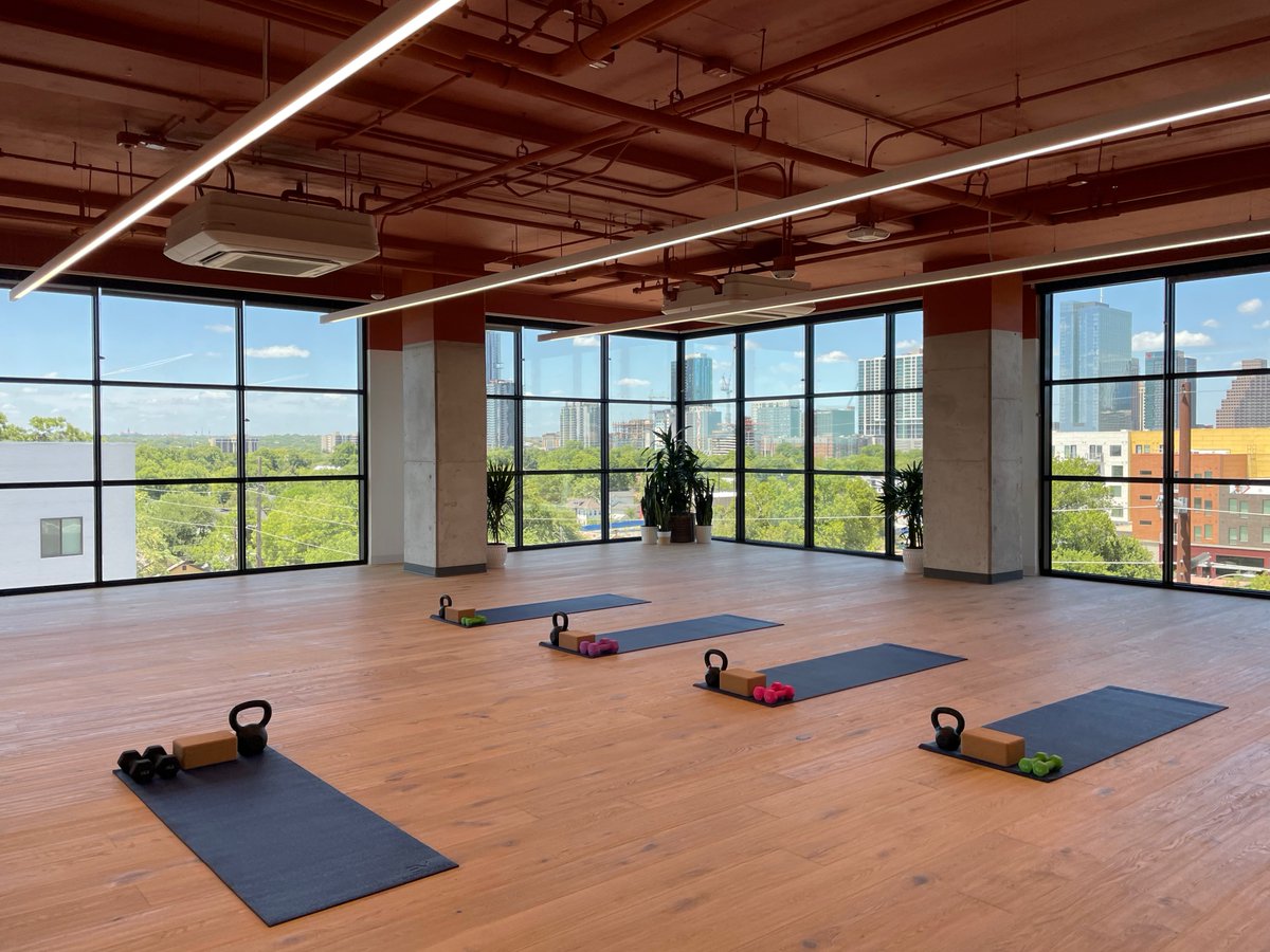 jrc_collins's tweet photo. When the pandemic hit, @atlassian went fully remote. This week, the #AtlassianATX office reopened in a new building all our own. There's a fitness studio, a parent's suite, tons of collaboration space, a wealth of perks, and an homage to an inside joke ... a rooftop pool. https://t.co/BwDwjAJmt9