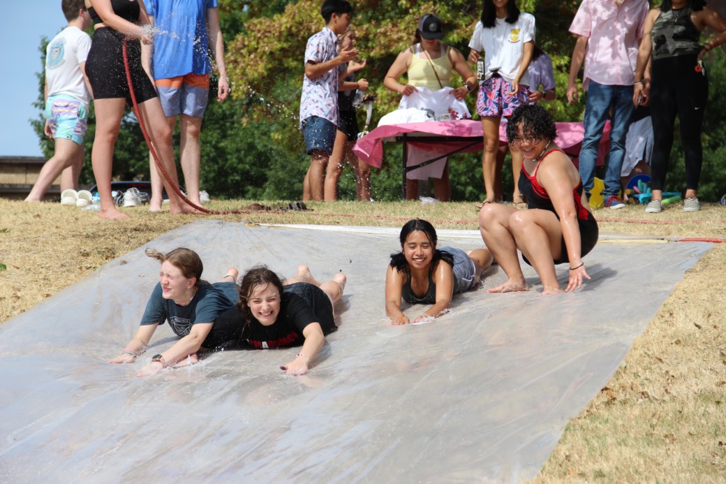 UofDallas's tweet photo. Our Summer Program students are making the most of their summer tie dying shirts and enjoying the slip nโ slideย down Jerome Hill! ๐ ๐ โ๏ธ #UDSummer #LoveYeUD #UDallas https://t.co/kNQ0l9eea9
