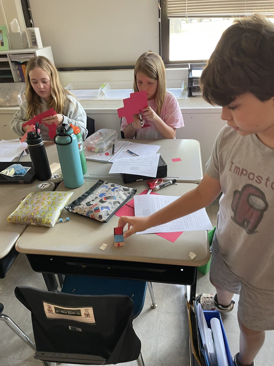 MsMcArthur_MPMS's tweet photo. Overheard in math in room 109 today: “This is actually fun! I wouldn’t even mind having this for homework!” 👏🏼 My job here is done. Well, not really. But it helps. Exploring rectangular prisms with nets. @HESSPLASH https://t.co/YaR9ggNQrF