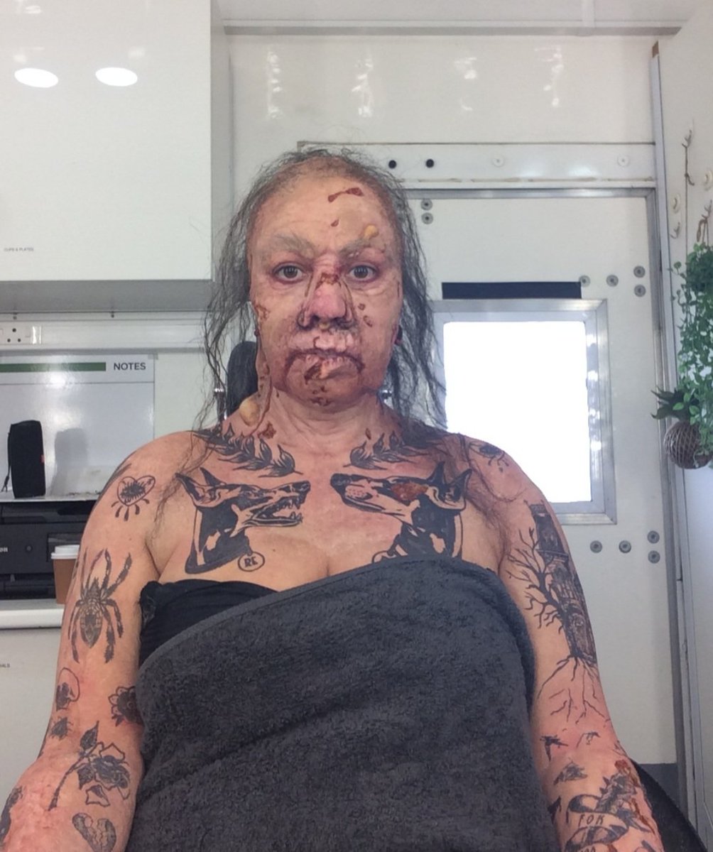 12. Becoming #MotherZero. Wig and eyebrows on. Off to my trailer for wardrobe. Lenses, blood and dirt on set. #ResidentEvil #ResidentEvilNetflix #BehindTheScenes #creaturefx