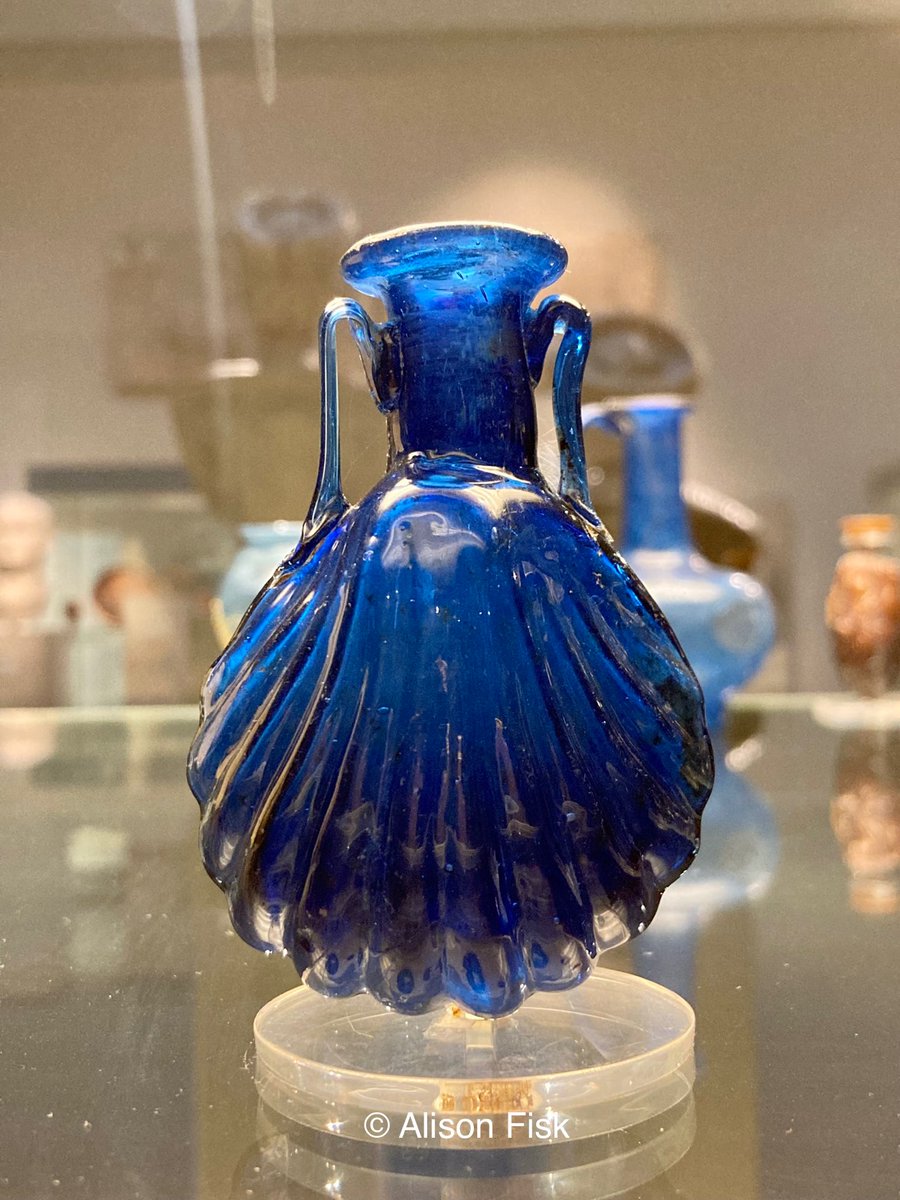 AlisonFisk's tweet image. The timeless beauty of ancient glass. A Roman glass scent bottle in the form of a shell. Mould-blown. AD 25-100. Photo: © Alison Fisk

#Archaeology