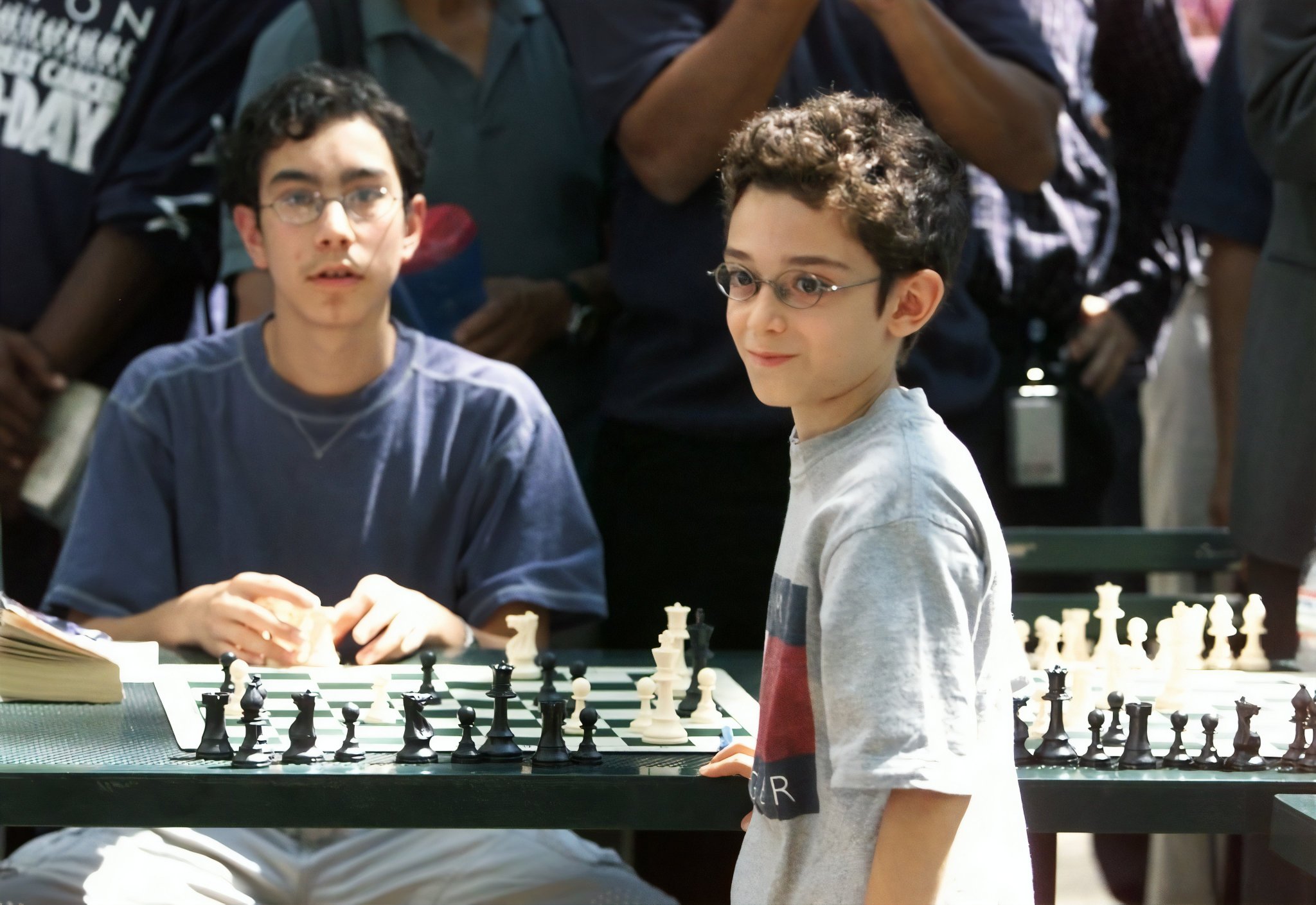 Olimpiu Di Luppi on X: 10-year-old Fabiano Caruana finishing off a  15-board simultaneous exhibition in New York City's Bryant Park on August  21, 2002. Today he turns 30.  / X