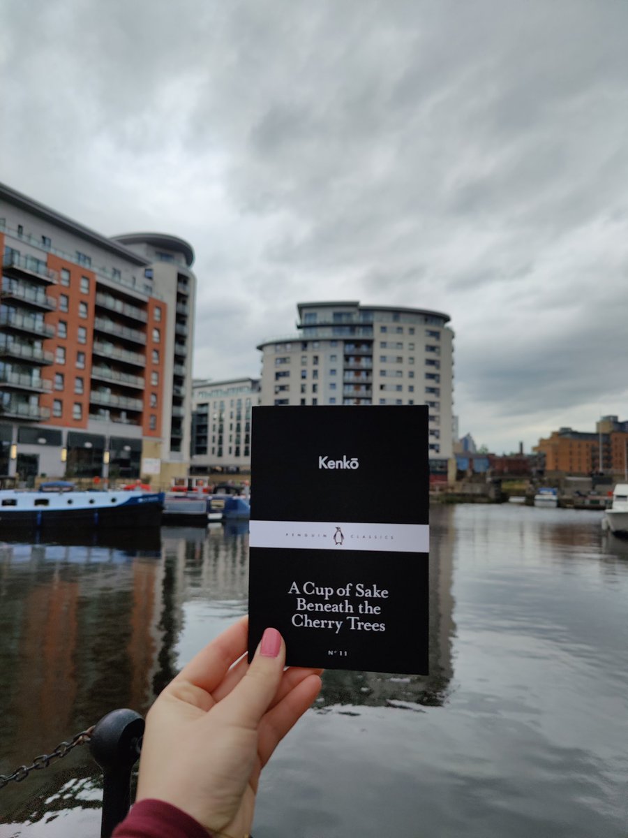 lita_eliza's tweet photo. "It is a most wonderful comfort to sit alone beneath a lamp, book spread before you, and commune with someone from the past whom you have never met." - Yoshida Kenkō. Exploring Leeds and #CoffeeTimeReading this tiny classic. What are you reading this weekend #BookTwitter? https://t.co/OnDfWMsMNy