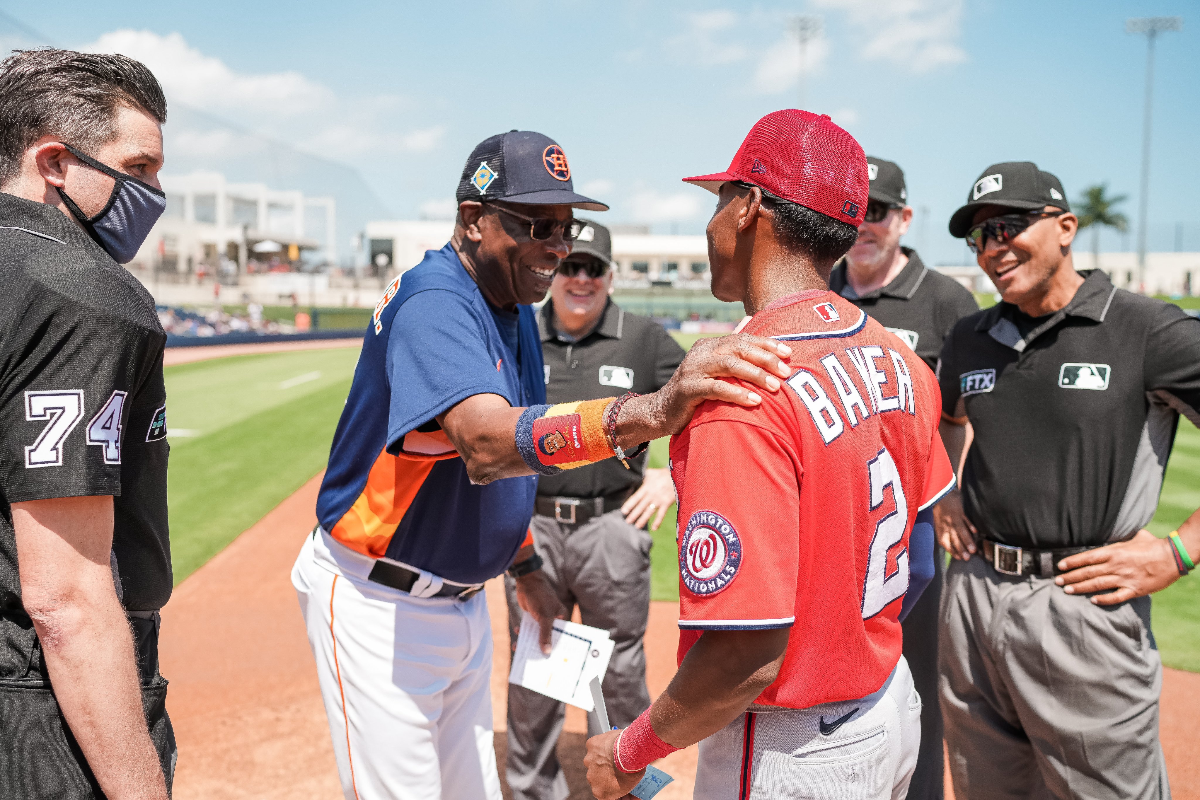 Dusty, Darren Baker exchange lineup cards for Nationals-Astros