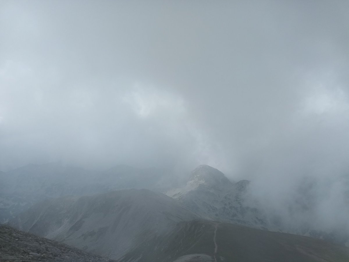 n_ouzounov's tweet photo. Weather at high altitudes can change within minutes. This from a hike today scaling Mount Vihren (Bulgaria's second highest). Weather was great until suddenly we got hit by heavy fog at the top. Made for some eerie views. #Vihren #Pirin #hiking #Bulgaria https://t.co/46eKvSXbis
