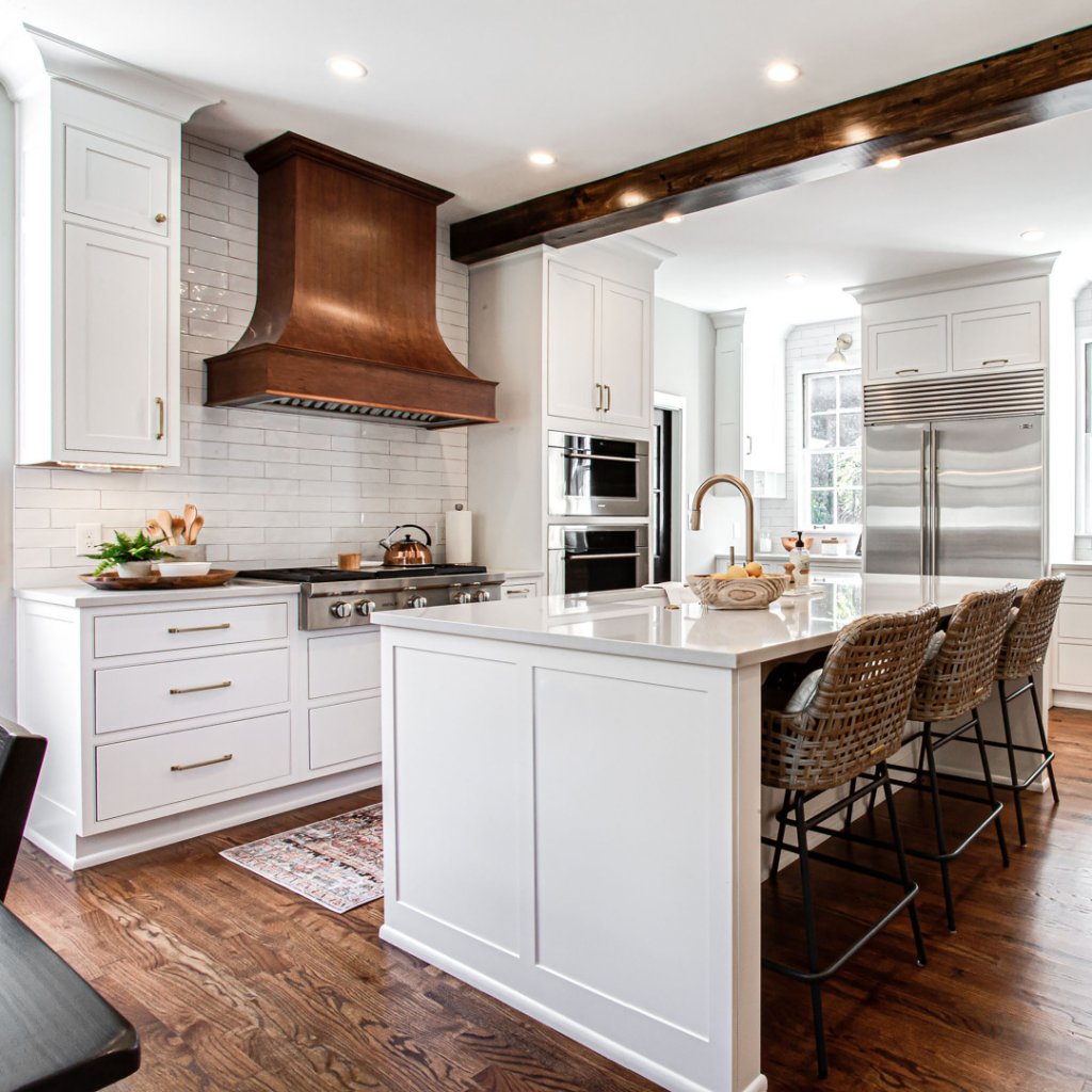 Elegant @Showplace_Cab Inset cabinetry brings a timeless appeal to your kitchen space.  What do you think of the White mixed with Stained wood?
#whitekitchen #insetkitchen #paintedcabinets  #kitchengoals #kitchendesignideas #southdakotabuilt
