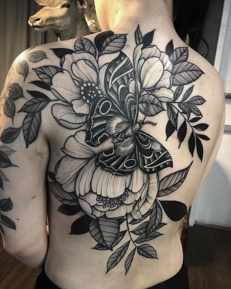 This tattoo is wonderful to look at. Opinions?? #tattoo #Tattoo #TattooFlowers #TattoButterflys 
Off topic of the tattoo I want to pop that zit...also tf is a taxidermy deer doing here lmfao. 
(Found on Pinterest)