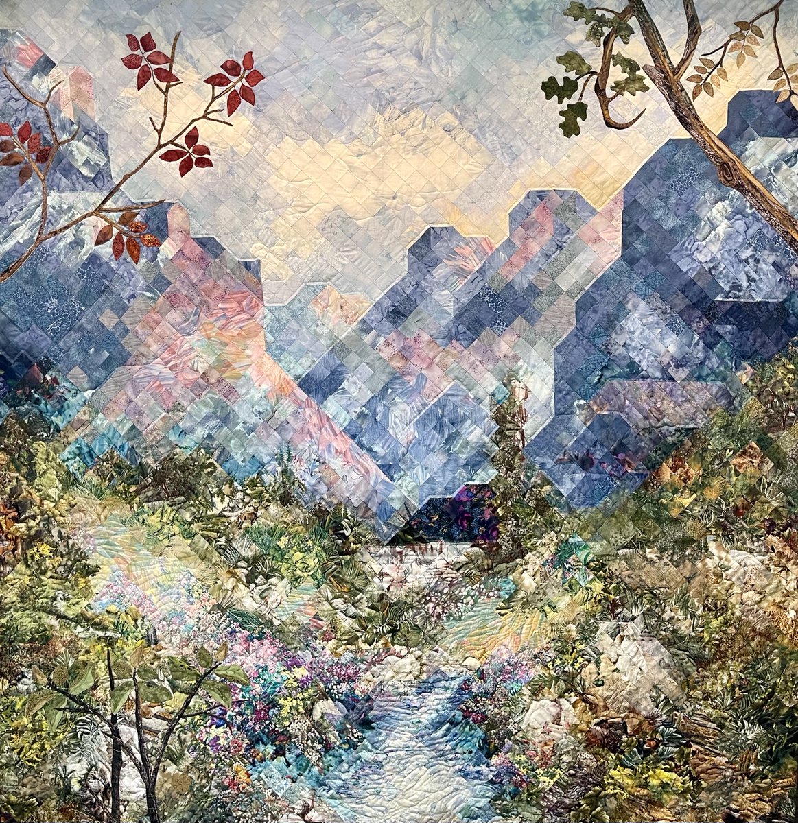 JonasSickler's tweet image. My mother started this quilt 20 years ago, and just finished it today. I can't imagine spending 2 decades working on one project like this.

I remember boxes of fabric strewn about like pieces of a jigsaw puzzle.

She had a vision.

It's extraordinary.