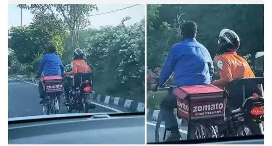 deswanews's tweet photo. साथ रहना जरुरी नहीं,  साथ निभाना जरुरी है. 

साइकिल चला रहे #Zomato डिलीवरी बॉय की #Swiggy एजेंट ने कुछ यू थामा हाथ, सड़क पर दिखा दिलकश नजारा❤

#viralphoto #viralnews #deswanewsbihar #sathsath #dosti #pyar https://t.co/DdA4K0OqRN