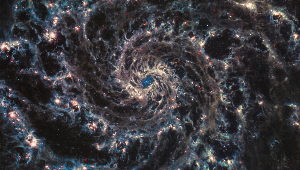 Colorful glowing dust in NGC628/M74. Can confirm something dark and scary might be going on in this galaxy. 😆 Further awesomeness from <a href="/janiceleeastro/">Dr Janice Lee</a>'s instantly public JWST program. 
flic.kr/p/2nyXpCj