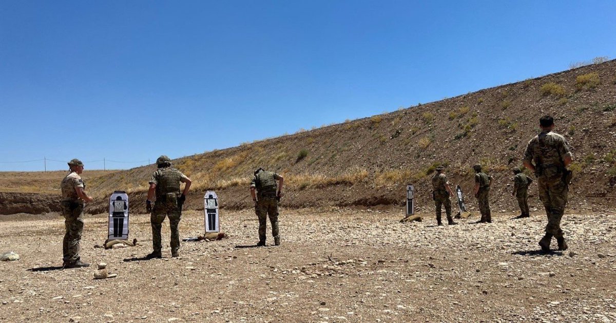 In Iraq the Queen's Company get to work on the ranges in Helmet and Body armour, the current temperature... a cool 44 degrees.