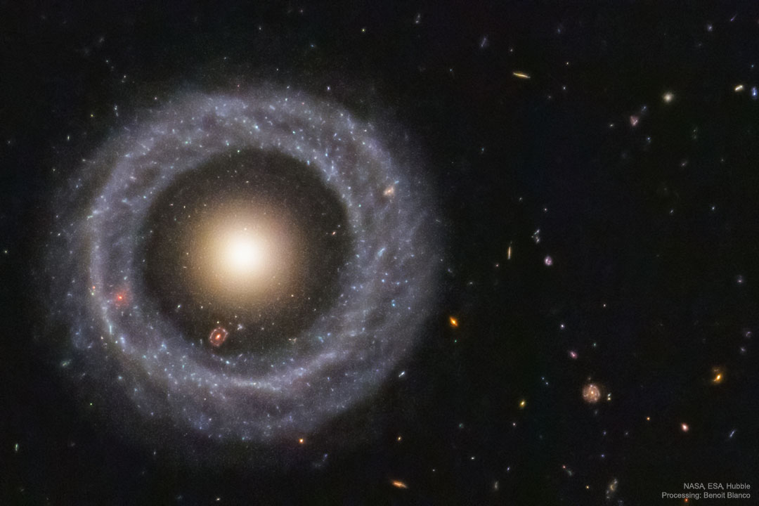 Hoag's Object: A Nearly Perfect Ring Galaxy
Image Credit: NASA, ESA, Hubble; Processing: Benoit Blanco
 Hoag's Object spans about 100,000 light years and lies about 600 million light years away toward the constellation of the Snake (Serpens).