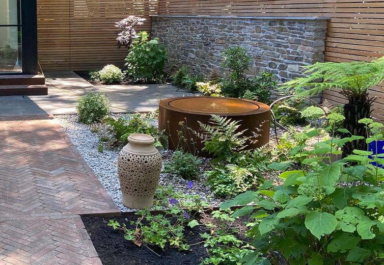 On hot days we long for shade. 
This courtyard in our #gardendesign project in Devon provides the perfect spot of dappled shade by surrounding woodland with the cooling and refreshing sounds of the water feature by ADEZZ, lantern by <a href="/potsandpithoi/">Pots and Pithoi</a> and landscaped by <a href="/UrbanEarthSW/">Philip Yolland</a>