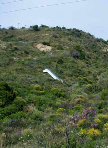 The 'escalator to nowhere' in Roseto Capo Spulico, Calabria, built where there should have been some kind of building and literally left in the middle of nowhere, one of the greatest signs of Italy's unfinished great works.