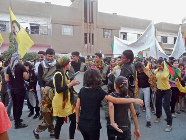 nailabozo's tweet photo. 10 years ago, i walked in the streets of qamishlo in #rojava (north syria) with thousands of kurds, celebrating what came to be the beginning of the rojava revolution. by far the most important, beautiful day of my life. #kurdishrights https://t.co/KSQaMwHpre