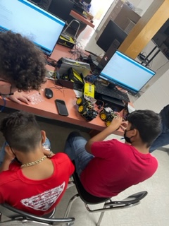 TAMUReCENT's tweet photo. The @TXWorkforce (TWC) sponsored La Joya ISD students to attend Camp Code recently.  WIT Jr members Carter Ponce and Edgar Castillo conduct demonstrations for @AlvarezTWCLabor.

#campcode #workforcedevelopment #STEM https://t.co/7w0CcXFmjp