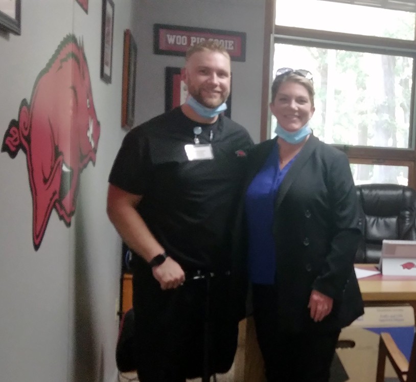 UARKOnline's tweet photo. #RazorBugTour Graduate Spotlight 🎓🌟 Congrats, Austin Kersey of El Dorado!

Austin hurt his leg while leaping for joy  during a #Razorback baseball game, he proposed to his wife at a tailgate, and now he is officially an alumnus with a BSN in nursing.
#onlinedegree #nursing https://t.co/qYeq28w39Z