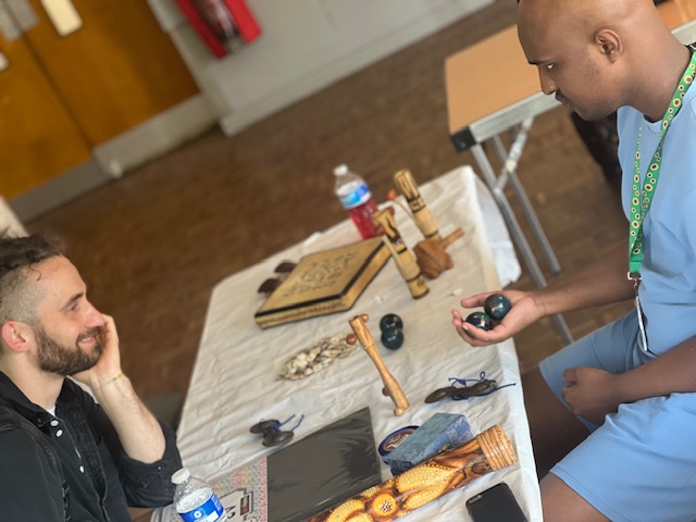 AutismDaryeel's tweet photo. Another successful coffee morning, we played and learned musical instruments from #Morocco and had art session decorating biscuits; cooling our selves with ice-lollies; lots of very cold drinks. Ruth Preocanin the centre manager joined us. @CityMayorLeic @DCCLeicsPolice #Autism https://t.co/5lBarllyl6