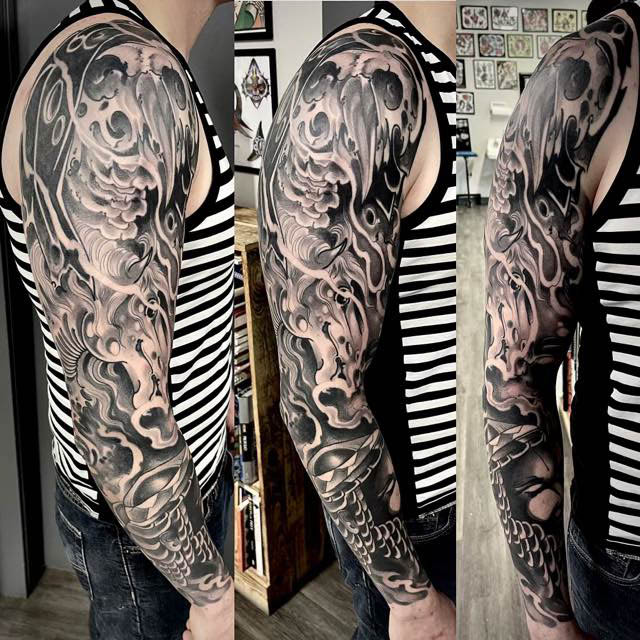 Japanese black and grey sleeve by Carl Sebastian TattooNOW