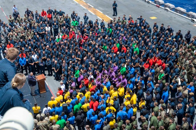 Secretary of the Navy Carlos Del Toro @secnav takes a photo with Sailors assigned to Wasp-class amphibious assault ship USS Essex (LHD 2) during an all hands call aboard Essex during RIMPAC U.S. Navy photo by MC2 Wesley Richardson and MC3 Richard Anglin #capableadaptivepartners