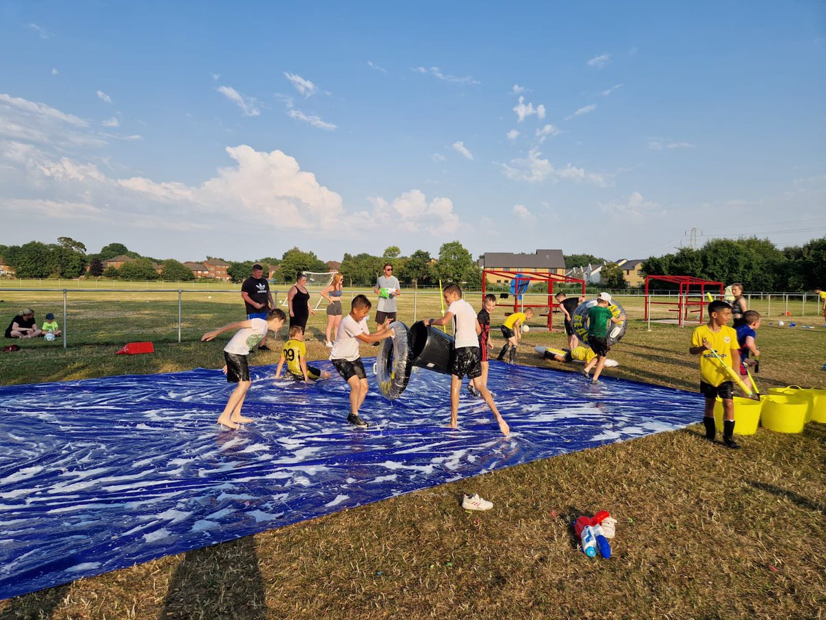 NSFCJunior's tweet photo. When the weather is ☀️ 🥵 , you incorporate a slip n slide and water fun into a training session 🔫💦🛝 #youthfootball #funinthesun #newportsaints https://t.co/ElKHGzN4cy