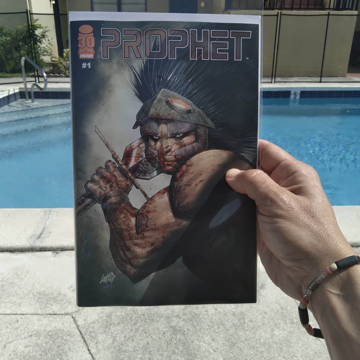 MannyG1138's tweet photo. Got the all clear from the doctor,  so #poolsideread is back! Today I am jumping in to Prophet #1 Remastered! I really do love reading comics under the sun and by the pool! @robertliefeld @CartoonKayfabe @ImageComics #comics #comicbooks #ncbd #prophet https://t.co/k90L8s1JE0