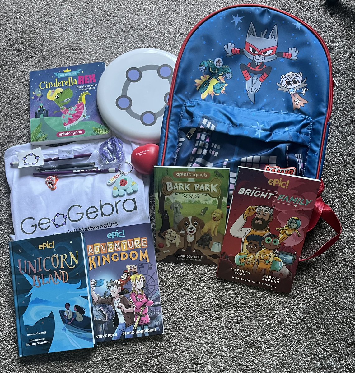 Goldenteach's tweet image. Thank you to the entire @BYJUS family 4 picking me 2 win these goodies! My 5 year old is proudly wearing @epic4kids Catninja backpack tomorrow w/ the @PlayOsmo #codingawbie keychain & is tossing the @geogebra frisbee around in the 90° weather! I’m also excited 2 read the books!