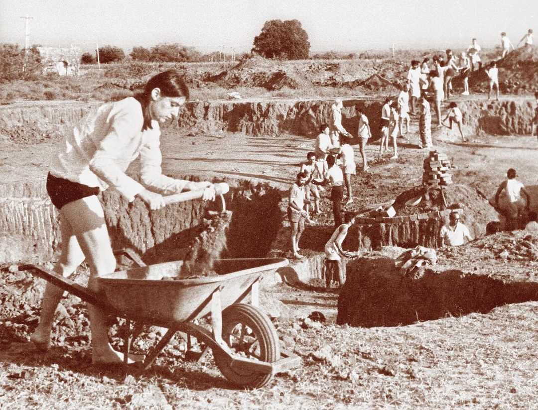 Shraddhavan digging the soil for laying the foundation  of Matrimandir in 1971.