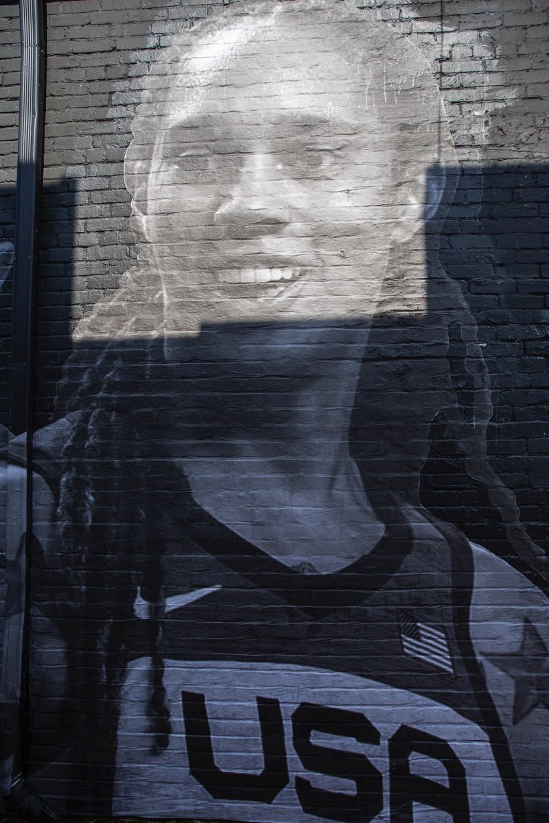 A new mural in Washington DC featuring @TheWNBPA member, BrittneyGriner, is being unveiled by the #BringOurFamiliesHome. Can't be at 3125 M Street in DC 11:30 TODAY? Watch live ➡️ bit.ly/BoFHMural #BringThemHome #WeAreBG (Artist: Isaac Campbell)