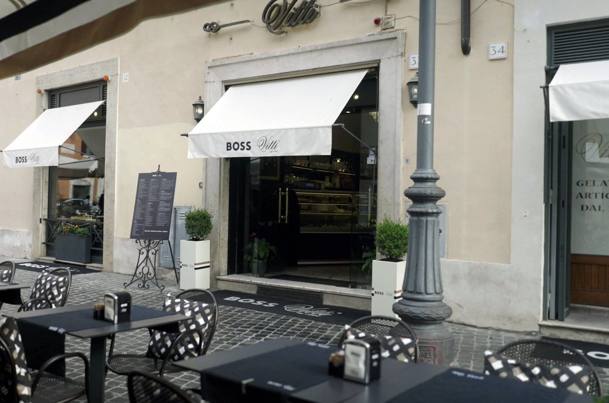 HUGO BOSS Corporate's tweet - "Going to Rome this summer? Make sure you  stop by the historic Vitti café, which we have turned into a full brand  experience, in celebration of our