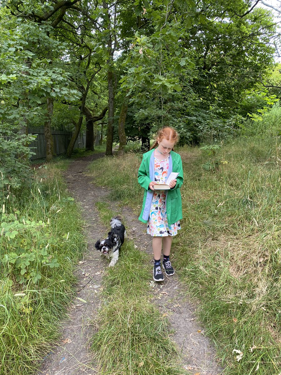 helfish1's tweet photo. Only came on the dog walk with me if she could bring her book. @Baddiel https://t.co/UgM2VI2nY9