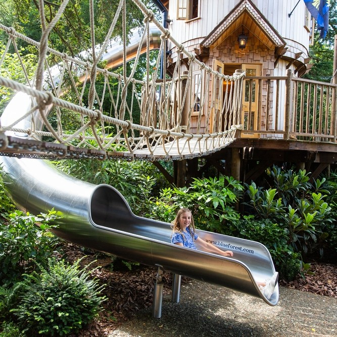 BlueForest_'s tweet photo. In our opinion, every treehouse should have a slide! You can swing from them, whiz down them and sneak into them - what more could you ask for!! #treehousefun #treehouseslides #treehousedreams #luxurytreehouse #outdoorfun https://t.co/9J2tQEAmrY