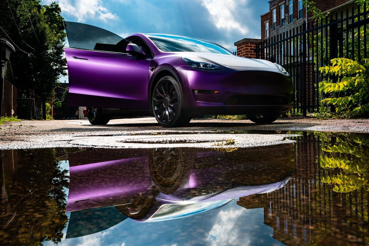 Macdizzledoo's tweet photo. Finally. The Tesla matches the stream! 😉😈🖤💜🙌🔥🥵 What do you think? Gotta figure out how to incorporate @VYRALTEQ into the spaceship to bring it all the way home! 😎 #teslamodely #customtesla #wrappedcars #carwraps #Tesla #ToTheMoon #teslamotors #customcars https://t.co/ybXTGVd3eU