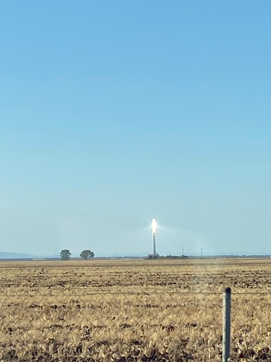 pegleggen's tweet photo. Currently melting in the Seville heat and on our drive we saw the #solartower, a thermoelectric 300 MW solar power plant on the outskirts of Seville. A collaboration between University of Seville, The IDEA, and Ciemat. #greenenergy looking awesome (maybe not up close) https://t.co/N0fLlogZOk