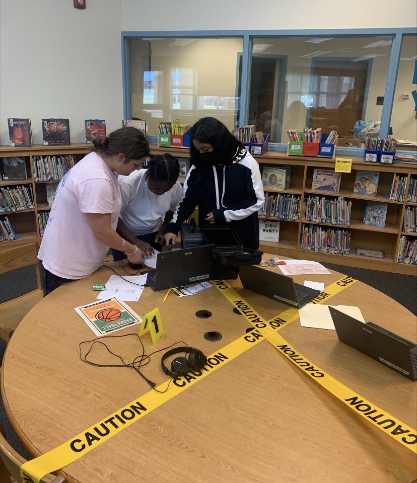 Math 1 students working on breakout boxes today!