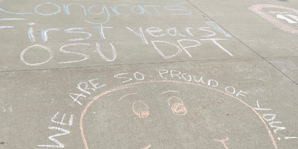 Our 2nd-year <a href="/TheOhioStateDPT/">OSUDPT</a> students are chalking the walk to welcome our DPT Class of 2025! This is leading up to Friday’s convocation where our second-year students will be placing white coats on their first-year buddies! Welcome Class of 2025!
