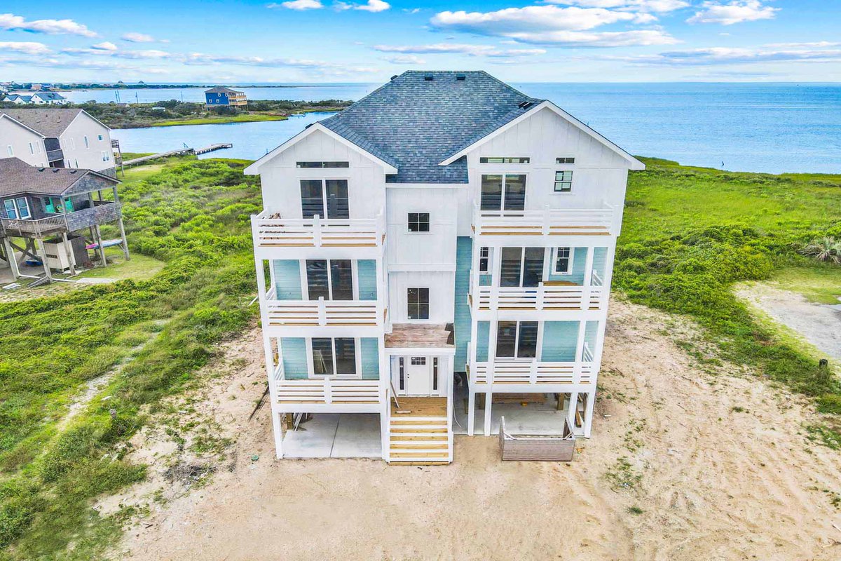 surforsound's tweet photo. Best of both worlds: #oceanfront AND sound front living at #1000 Bellavues! Newly constructed #OBX home with availability starting November 2022!☀️🌊 Book direct at: https://t.co/xdi0gW3uoJ https://t.co/HQXSiuNDVR