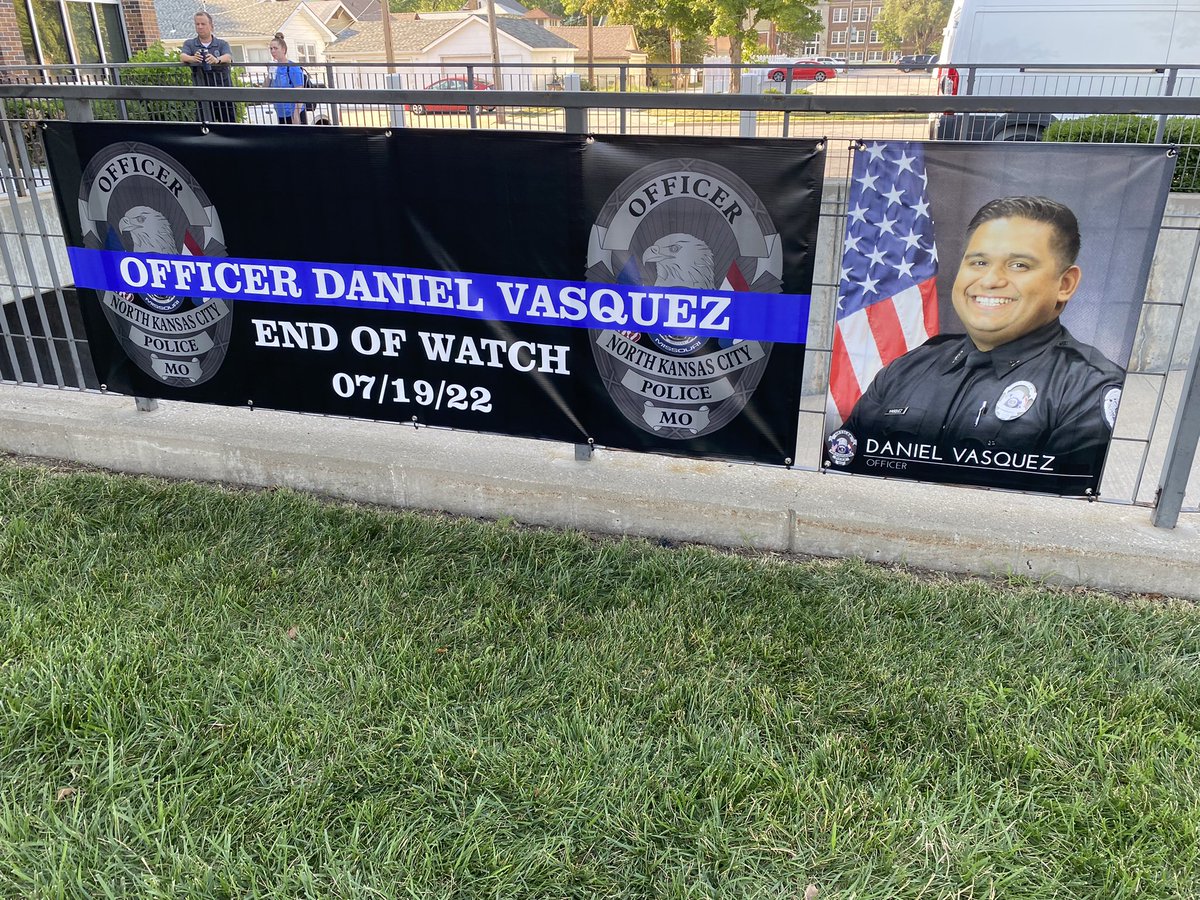 meganrabundis's tweet photo. The memorial outside of #nkcpolice is growing for fallen officer Daniel Vasquez. @KSHB41 https://t.co/EmLIgtSuMi