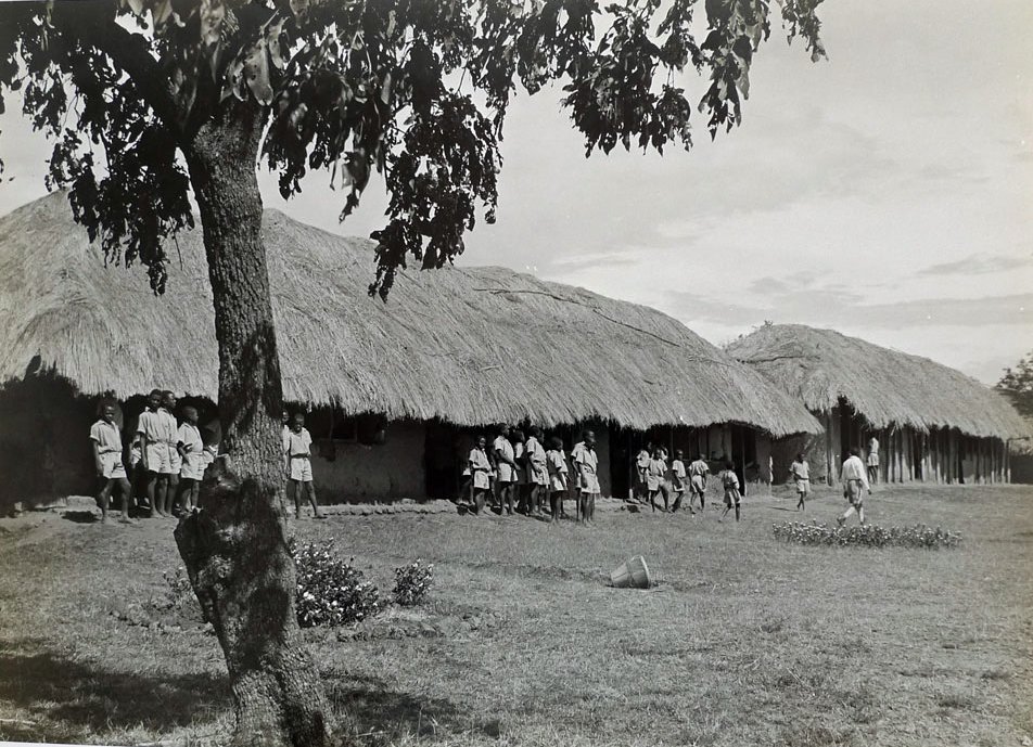 Busoga College Mwiri. 

It is not clear when this picture was taken. However, it is captioned "first classes at Busoga College Mwiri..."

Busoga College Mwiri was founded in 1911 to educate the sons of the chiefs of Busoga. 

Photo:hipuganda.org/smart_collecti…