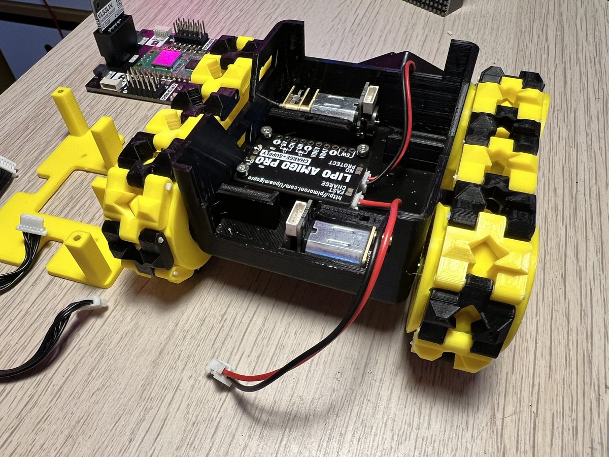 kevsmac's tweet photo. Some more SMARS inventor photos; you can see the @pimoroni LiPo Amigo Pro at the bottom, next to the MMME motors. The next layer has the Galleon battery and cables attached. #smars #robot #micropython #robotics #raspberrypi https://t.co/VYxT3H2sn2