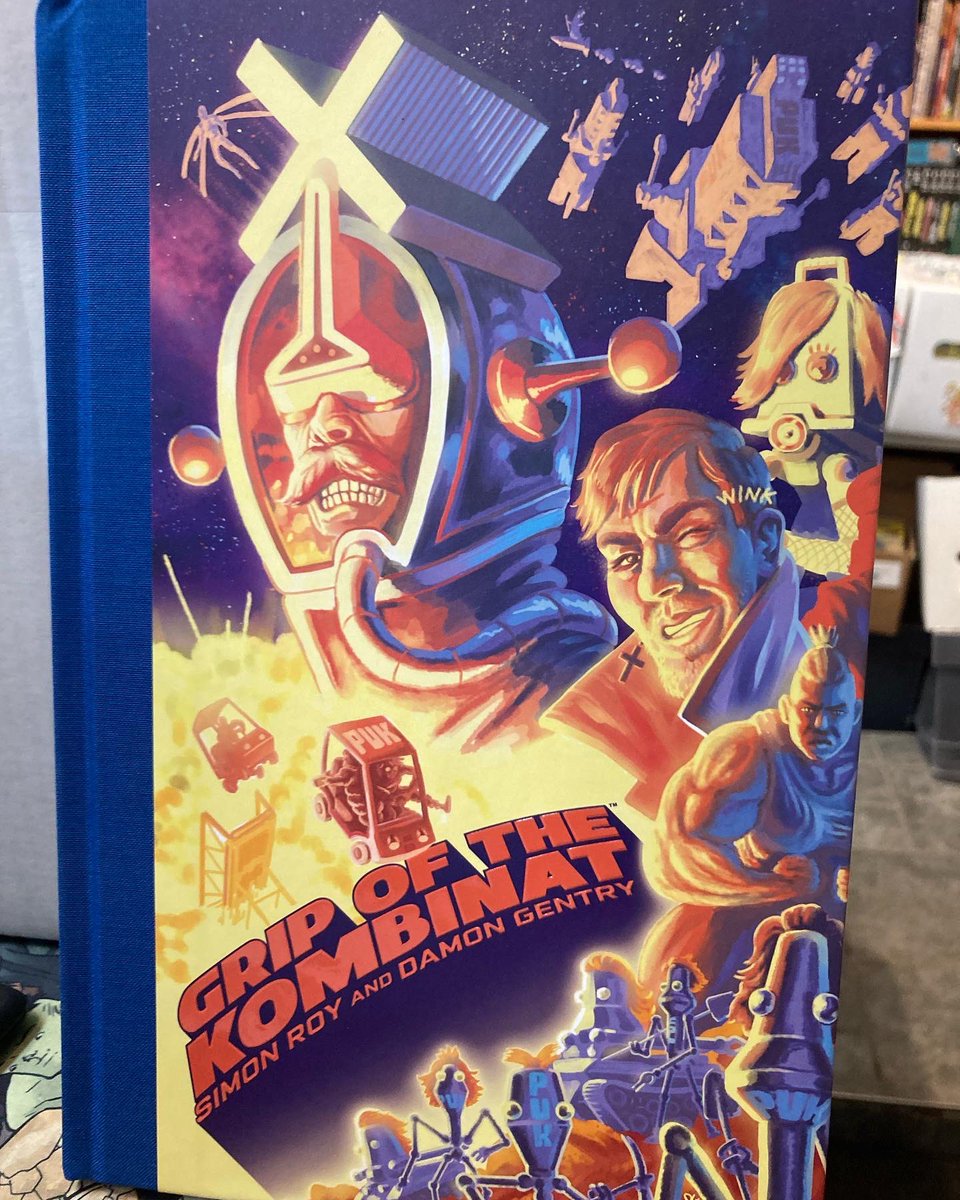 strangeadventrz's tweet photo. “An unholy mix of Verhoeven and Asimov”! The hardcover edition of Simon Roy and Damon Gentry’s GRIP OF THE KOMBINAT is in stock now for $20, featuring bookplates signed by the creators! #gripofthekombinat #simonroy #damongentry #readmorecomics https://t.co/EAIavN7HrZ