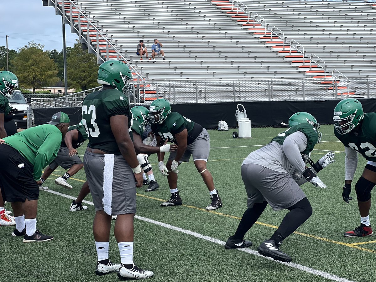 Coach Lawrence with the OL working on reach steps  #ArkansasAttack #MLFB