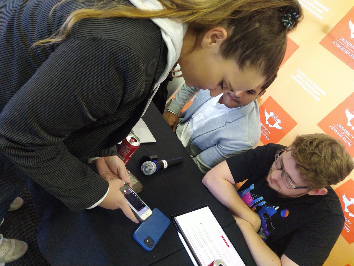 TiyaniTee's tweet photo. Judges ask that the team show a sample of questions on the game. It's the finale of the UJ Blockchain Innovation Bootcamp and Hackathon. #UJBlockchainHack https://t.co/mOsqRvA2Xi