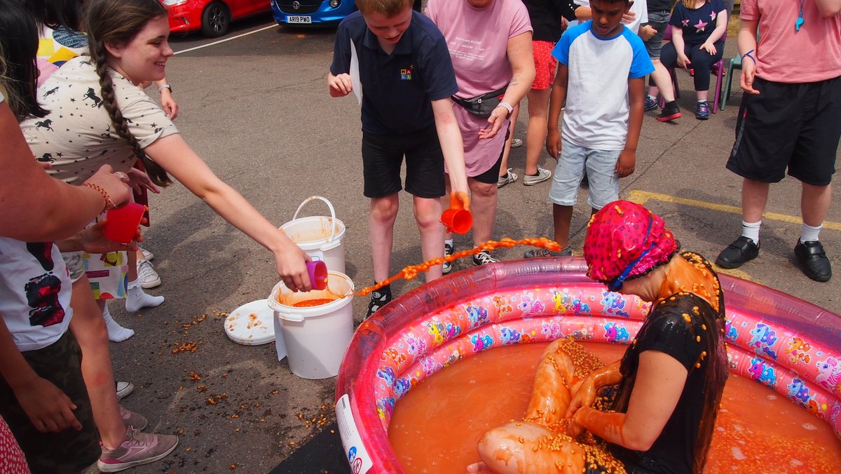 hallschoolnfk's tweet photo. WE'VE ONLY 'BEAN' AND DONE IT! 🥳

Thank you to Chloe our P.E Instructor for 'beaning' a good sport and taking the plunge! Our students enjoyed watching or throwing beans over Chloe. Well done everyone!

#hallschoolheroes https://t.co/6fy4twLcA6