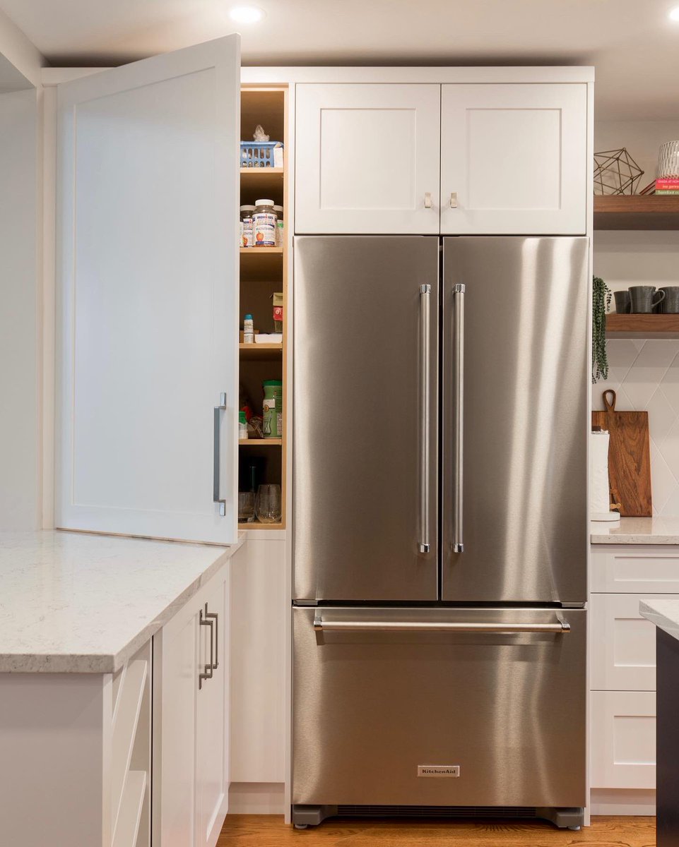 CatalystBuilds's tweet photo. No room for a walk in pantry? We got you! A larger, built-in upper cabinet can conceal your pantry staples and still have them close at hand. It’s an open and shut case. 😉  
build: @CatalystBuilds 
design: Cedar Interior Design
#whitekitchen #pantry #storage #kitchenrenovation https://t.co/uG2nTH5Gfd