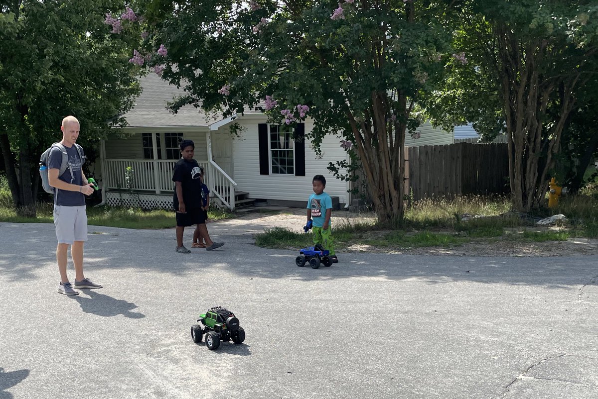 PMEPioneers's tweet photo. PME staff hopped on the 🚌 and visited our base students to provide school supplies and info about the 1st day of school on Monday. We also had fun playing monster trucks and were surprised with treats from a student 💜💙 #interactivecommunity #smallschoolbigcity @wcpssmagnets https://t.co/BBaArDT8af
