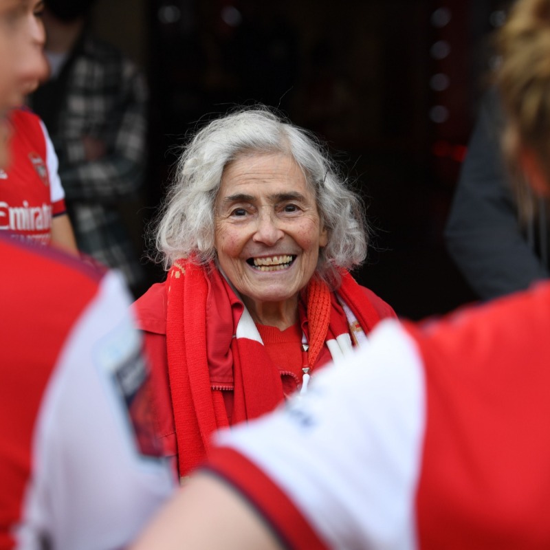 Arsenal's tweet photo. A true club legend. The ultimate supporter. 

For years, Maria attended 𝗲𝘃𝗲𝗿𝘆 men’s, women’s and academy game to support The Arsenal. 

Her spirit, love and commitment to the club will live on forever. 

Rest in peace, Maria ❤️